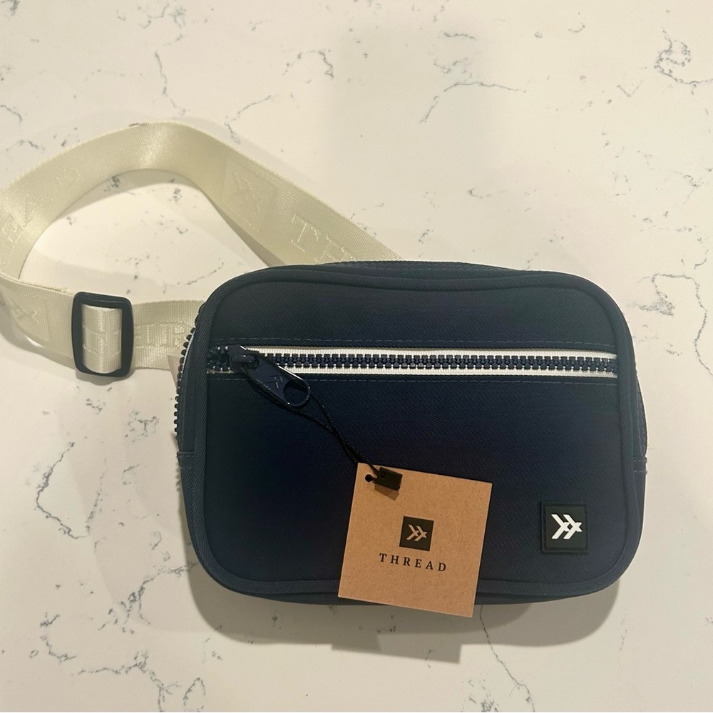 Blue and White Crossbody Bag with Modern Design